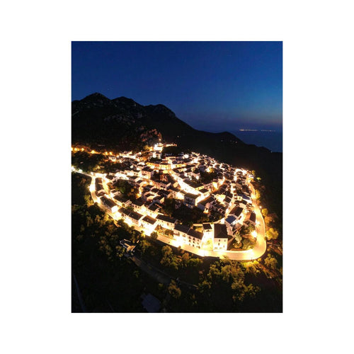 Wandbild kuestenstadt bei nacht